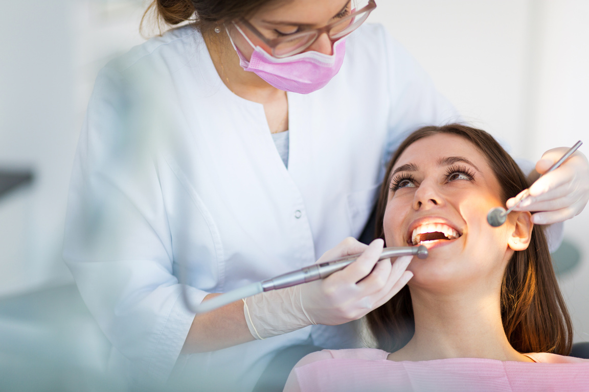 Dentist and patient in dentist office